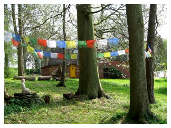Prayer Flags near Coach House at Lam Rim Buddhist Center Wales